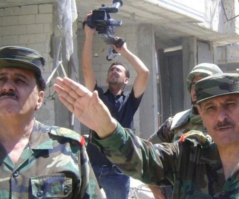 Syrian Defense Minister Tours Seized Homs District