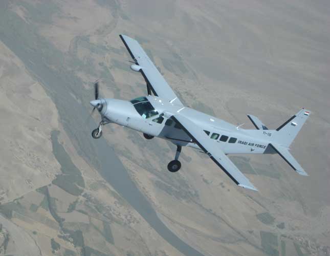 An Iraqi Air Force Cessna 208B Grand Caravan flies over Iraq on a training sortie.