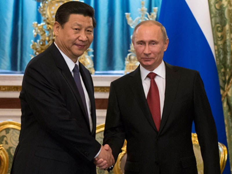 China Vows Stronger Military Ties with Russia