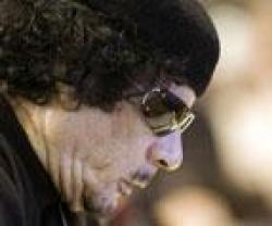 China Denies Arming Qaddafi